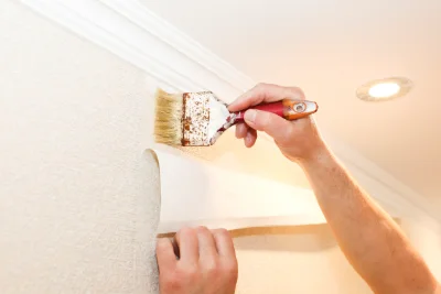 Pose de papier peint à Moon-sur-Elle — revêtements muraux et toiles de verre